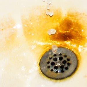 Rusty sink caused by iron in water